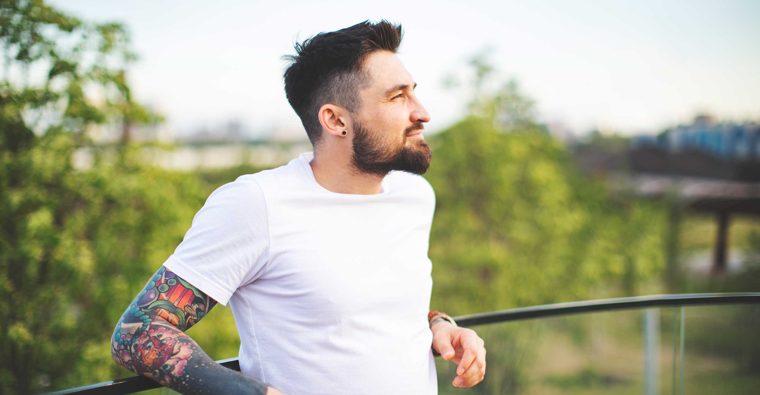 Asian woman smiling at the camera having found a sober living arrangement.